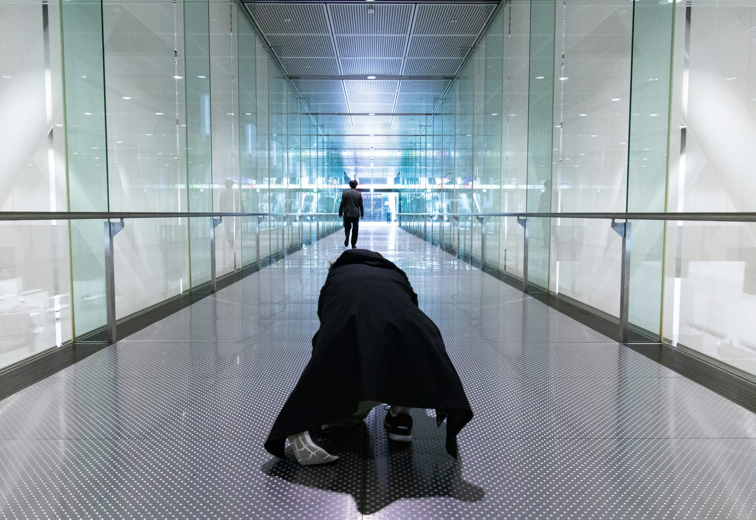 Illustration showing traveler stressed over missing luggage at an airport