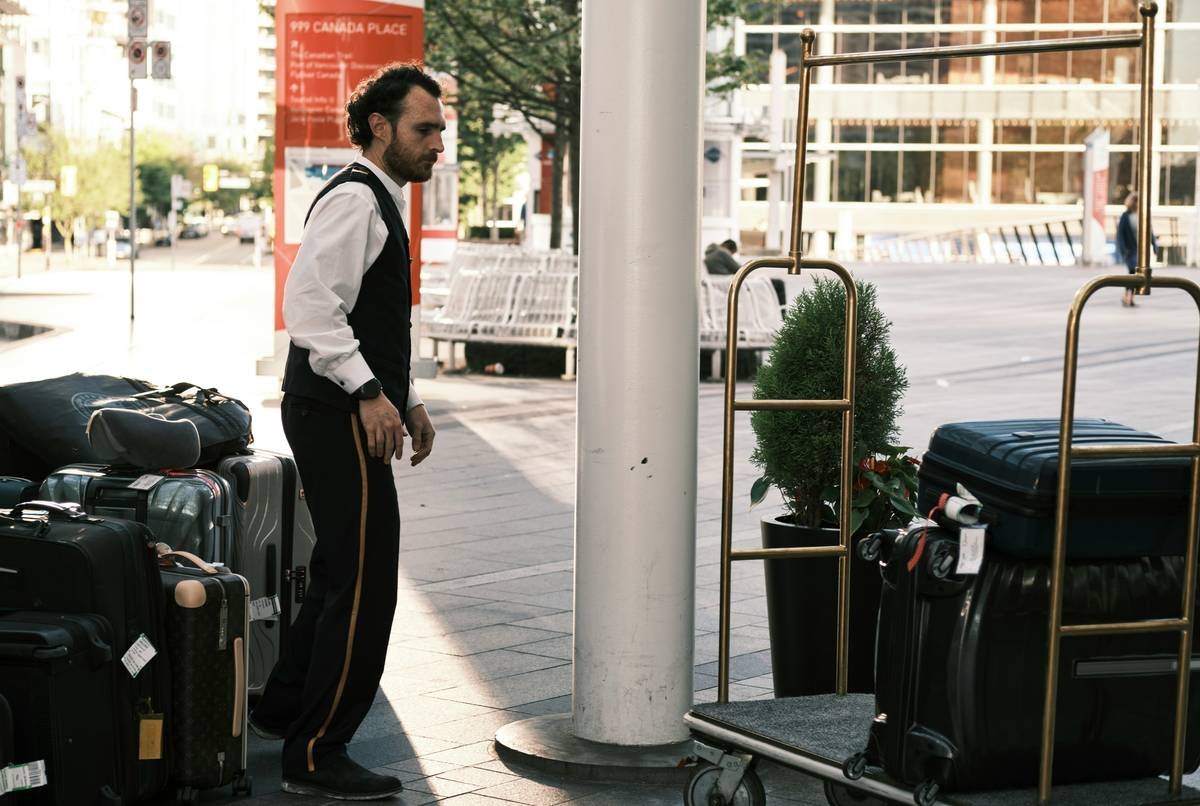 A traveler filling out a form for travel insurance reimbursement