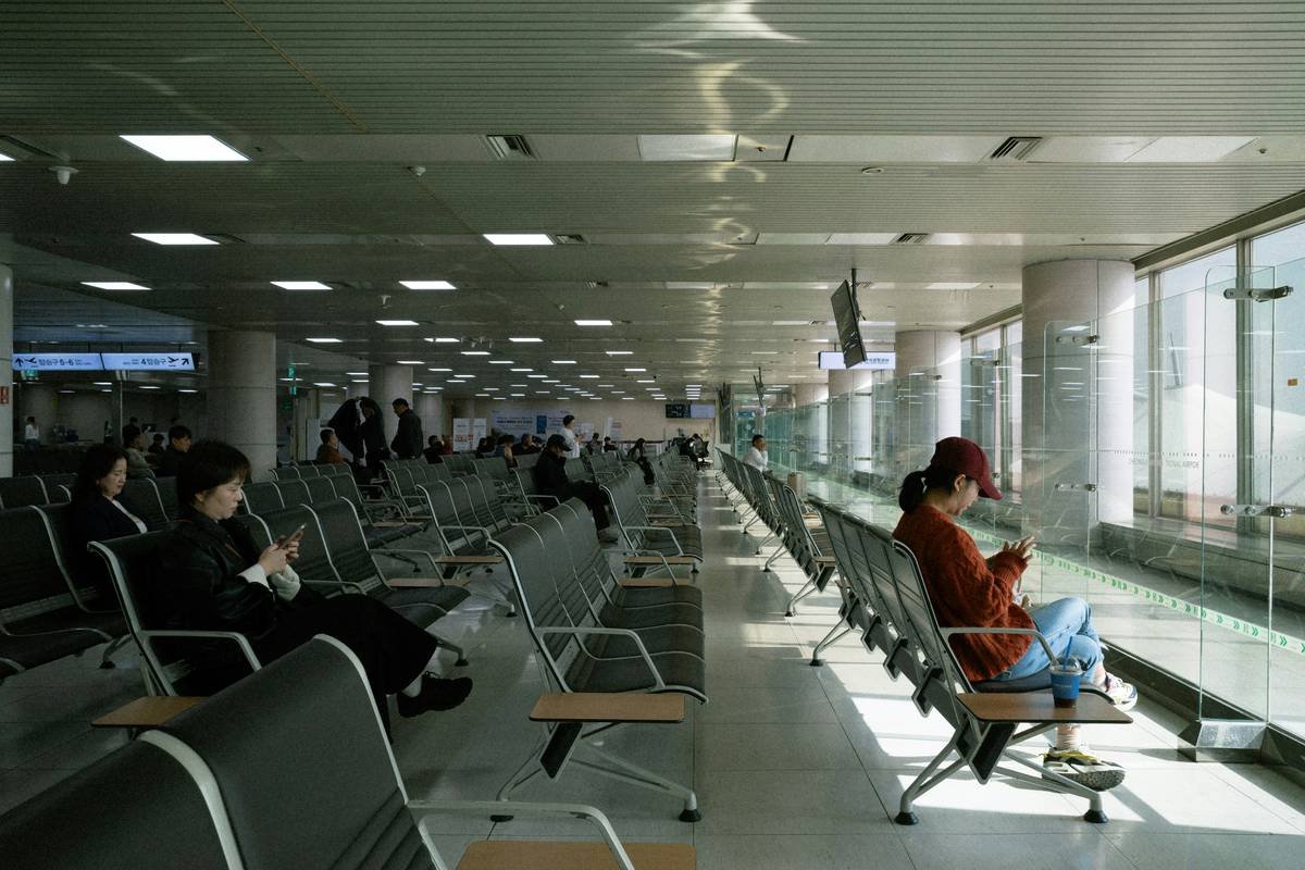 Close-up of filled-out baggage claim spirit form with checklist beside it